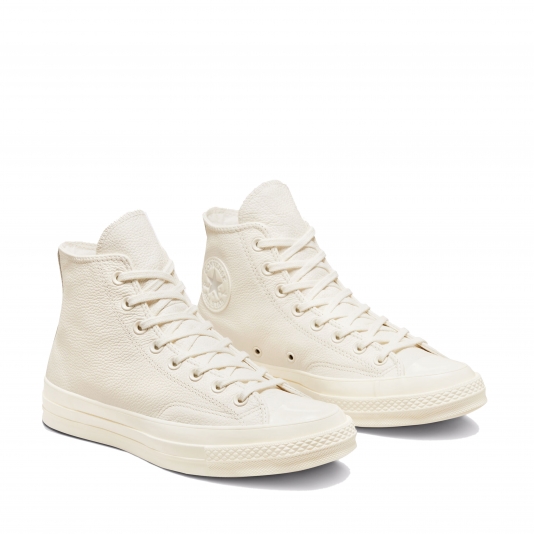 White leather chuck taylors store